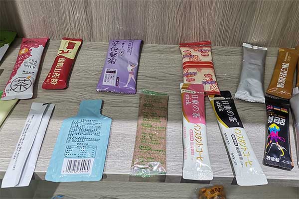 奶茶粉末包装机可采用三边封、四边封、圆角袋型