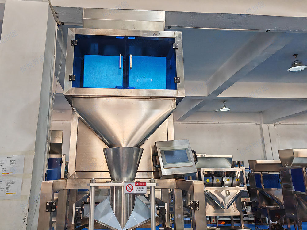 大米自动称重包装机主要由称重系统、给料系统、包装系统和控制系统等组成